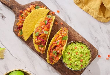Tabla de tacos de cochinita pibil hechos con tortillas de dieta.