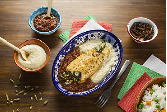 Pollo relleno de huitlacoche con salsa de chapulín