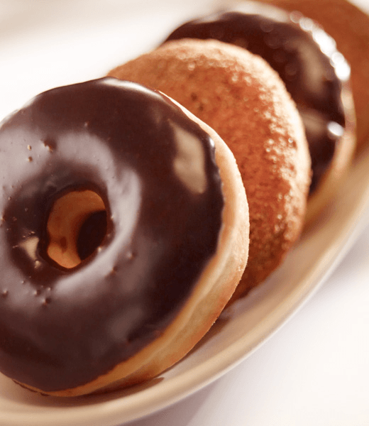 Donas cubiertas con chocolate | Recetas Nestlé Donas cubiertas con chocolate | Recetas Nestlé