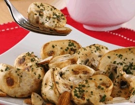 Champiñones con mantequilla y almendras