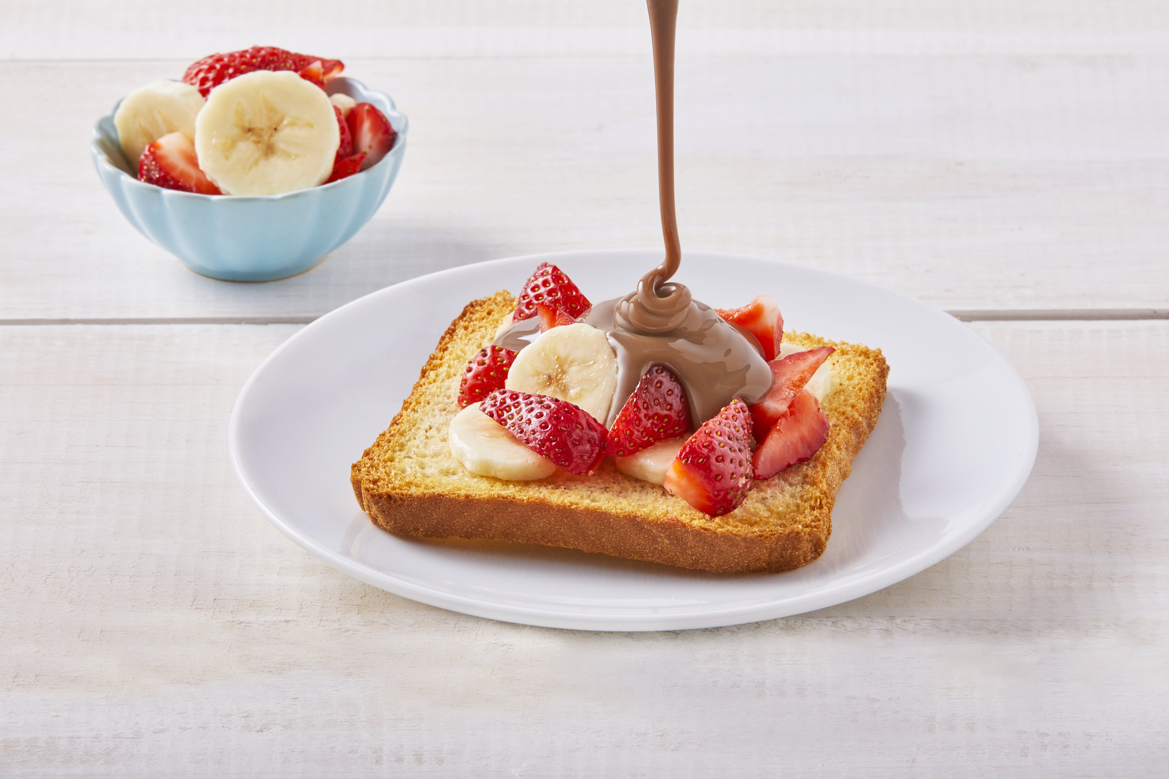 Pan tostado con plátano y fresas