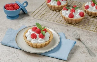 Tartaletas de vainilla con frambuesas Tartaletas de vainilla con frambuesas