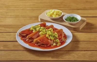 Enchiladas al pastor Enchiladas al pastor