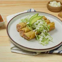 Tacos Dorados de Frijol con Queso