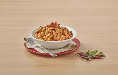 Coditos cremosos con chorizo Coditos cremosos con chorizo