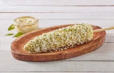 Elotes con aderezo de epazote