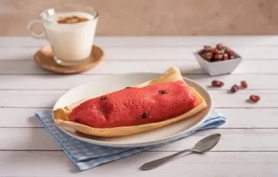 Tamal de Dulce con Pasas Tamal de Dulce con Pasas
