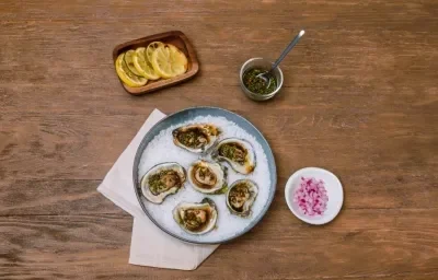 Ostiones asados con salsa rasurada Ostiones asados con salsa rasurada
