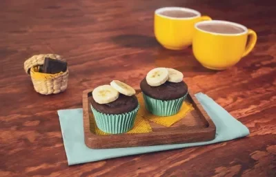 CUPCAKES de CHOCOLATE con PLÁTANO preparadas con Chocolate ABUELITA® Reducido en Azúca CUPCAKES de CHOCOLATE con PLÁTANO preparadas con Chocolate ABUELITA® Reducido en Azúca