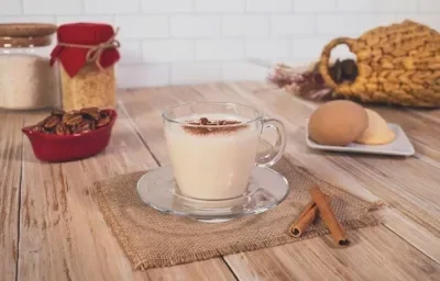 ATOLE de ARROZ preparado con Alimento en Polvo CARNATION® CLAVEL®