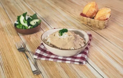 ARROZ con CREMA de HONGOS preparado con CARNATION® CLAVEL® ARROZ con CREMA de HONGOS preparado con CARNATION® CLAVEL®