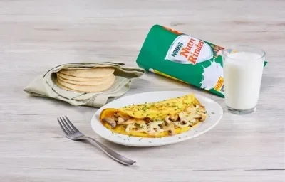 Omelette con champiñones