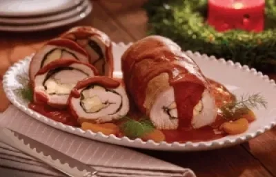 Lomo relleno en salsa de tres chiles Lomo relleno en salsa de tres chiles