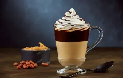 PIKE NUT COFFEE preparado con Leche Evaporada CARNATION® CLAVEL® PIKE NUT COFFEE preparado con Leche Evaporada CARNATION® CLAVEL®