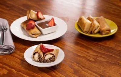 Rollitros de plátano con chocolate Rollitros de plátano con chocolate